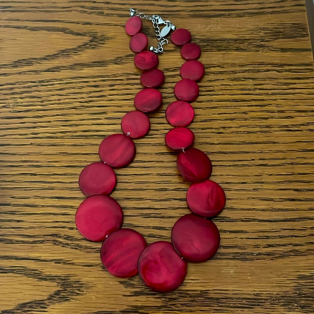 Red pendant necklace with matching earrings